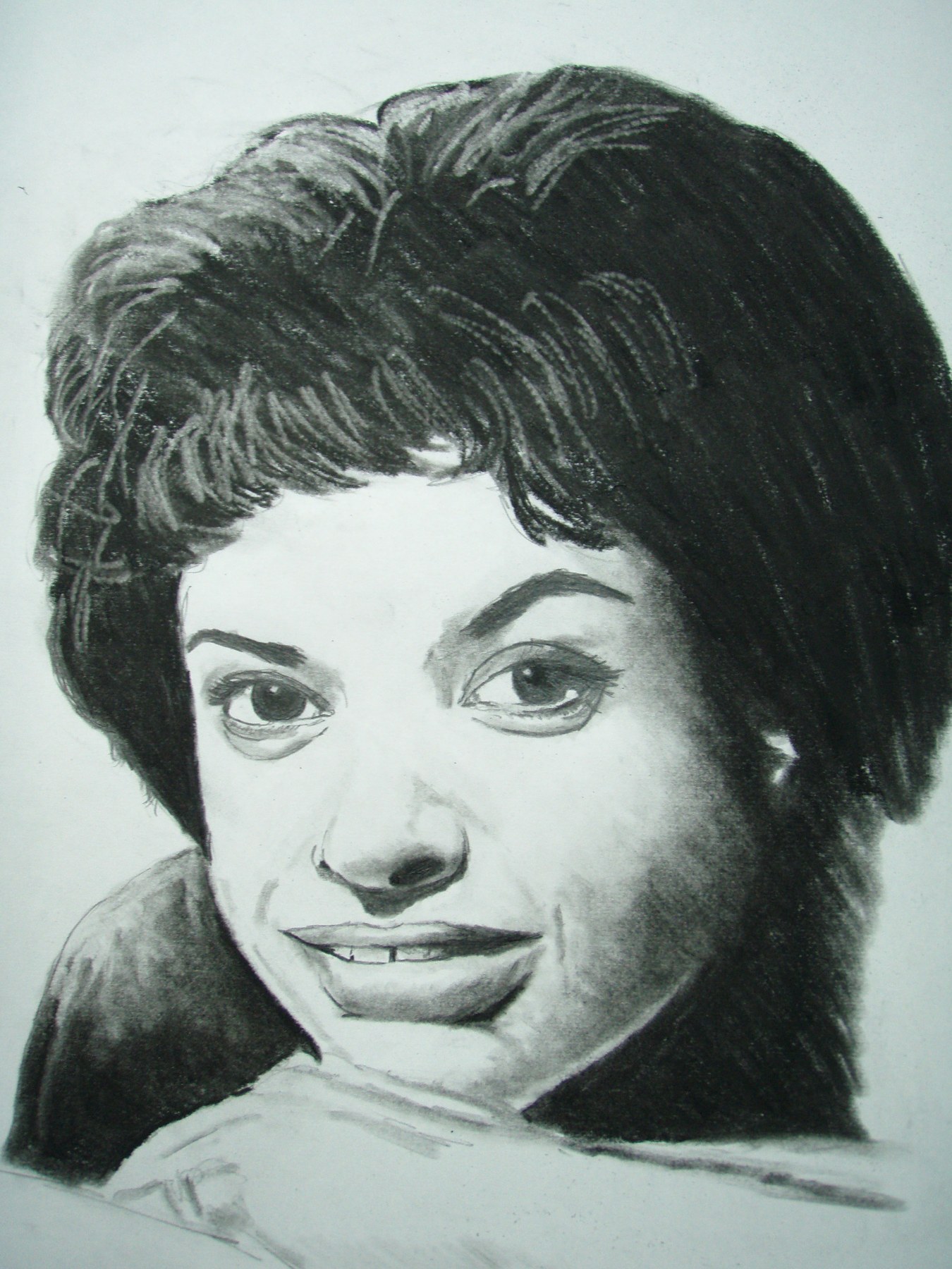 Monochrome portrait of a woman with short dark hair