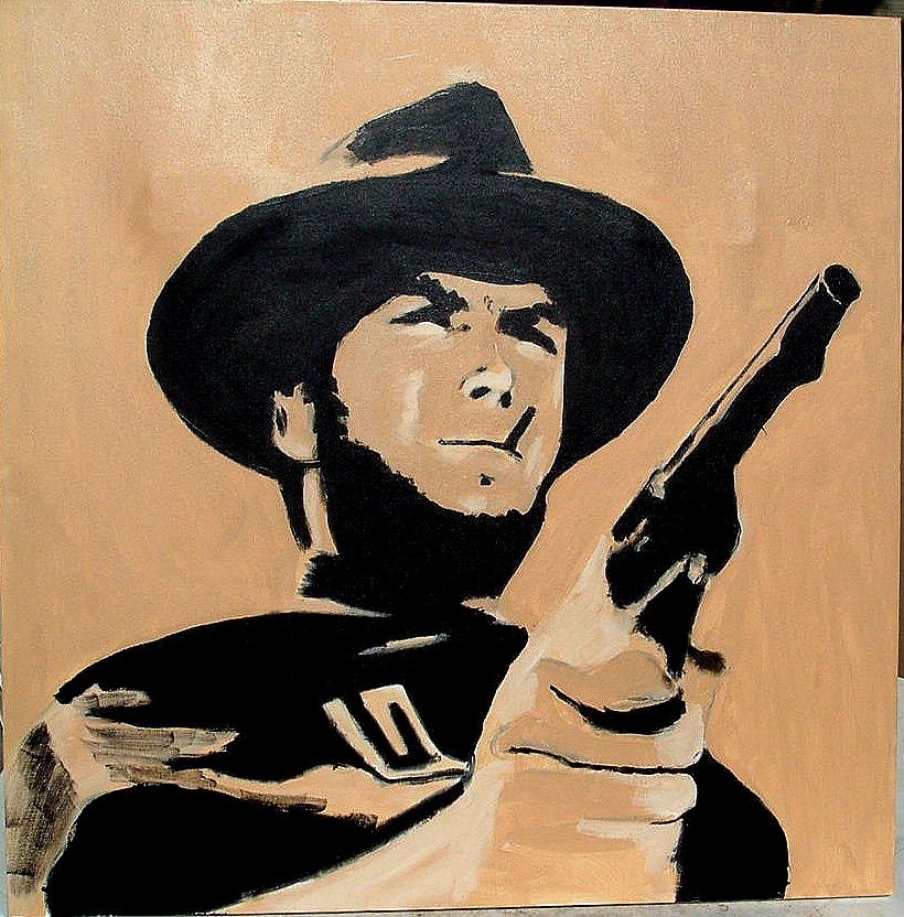 Western character wearing a black hat and holding a gun